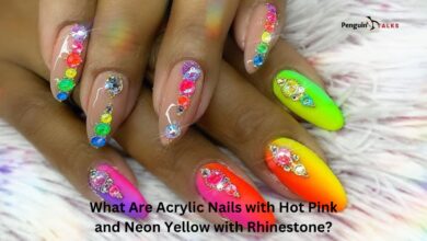 acrylic nails with hot pink and neon yellow with rhinestone